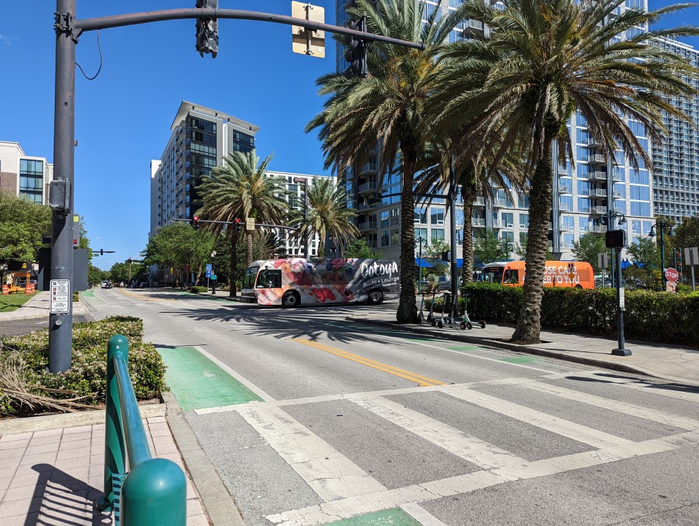 Picture of a bus and a crosswalk